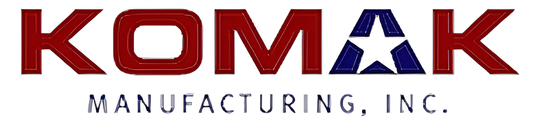 KOMAK Manufacturing logo with star design